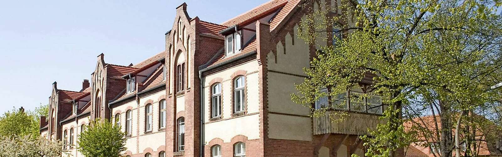 <p>Hausansicht in der Schwarztkopffsiedlung Wildau</p>